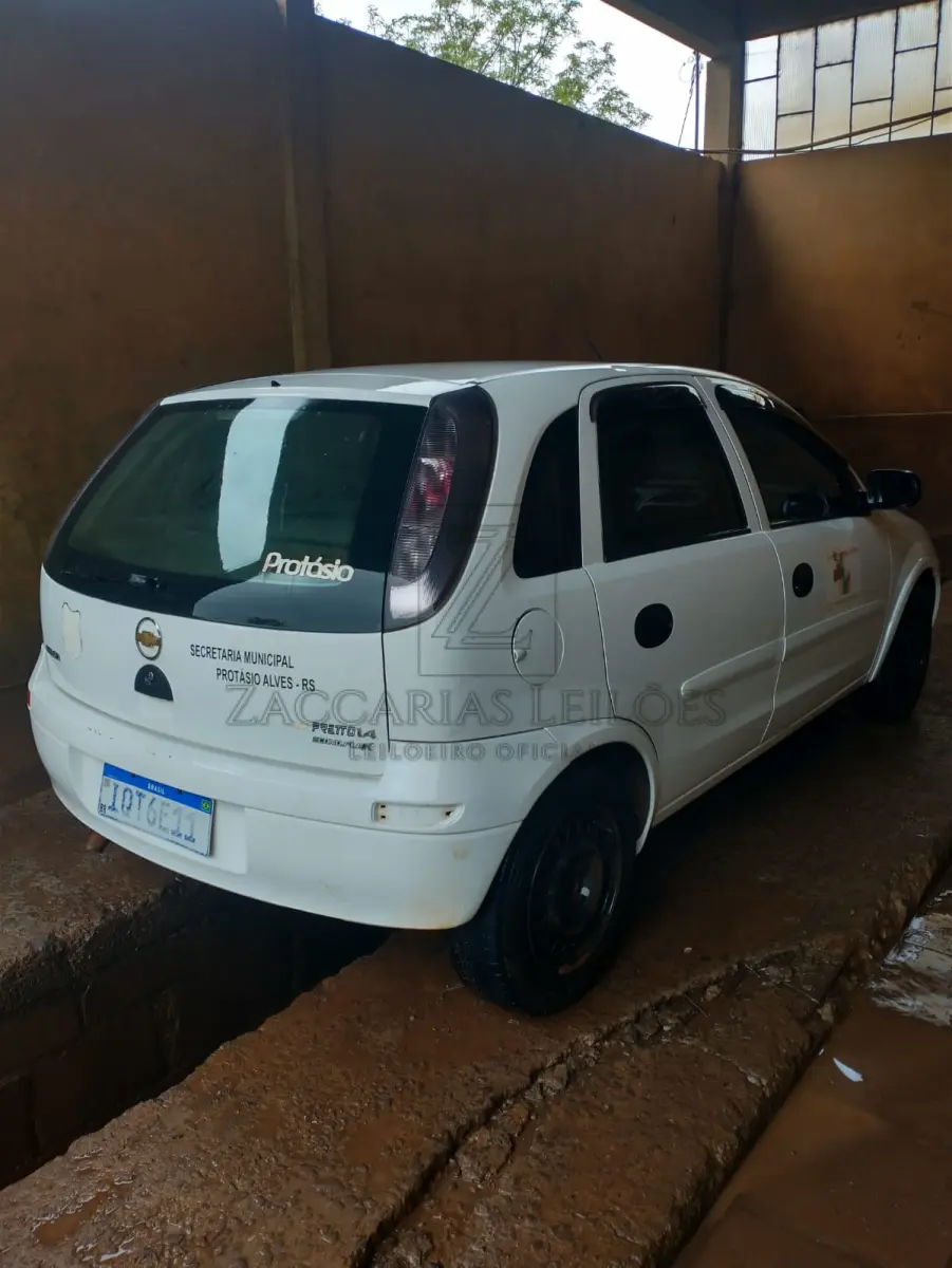 LOTE 001 - Um automóvel da marca GM-CHEVROLET/CORSA HATCH MAXX, ano/modelo	2010/2011, cor branca, placas IQT-6E11
