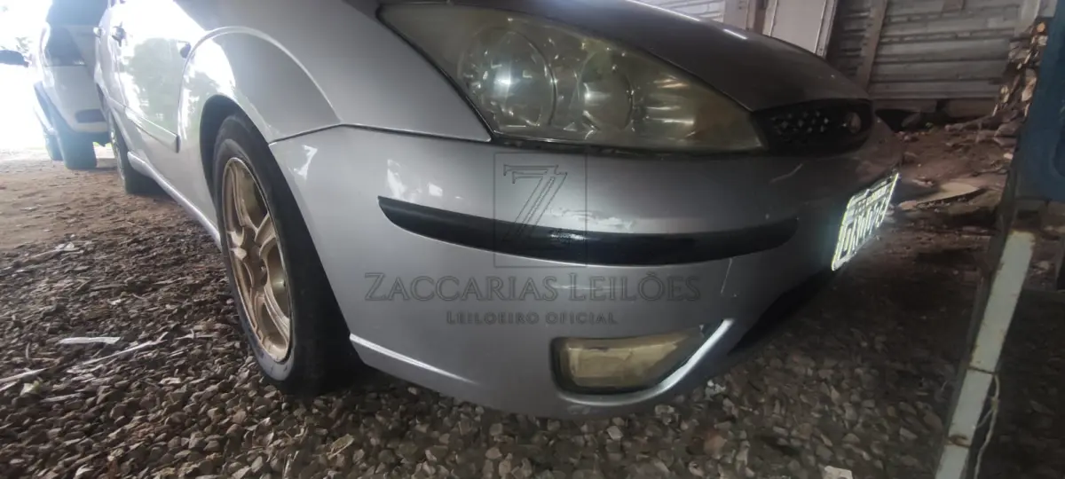 LOTE 013 - FORD/FOCUS GHIA 2.0LHA, Ano Modelo:2003/2004, Placa DNO 0248, Cor Prata, Combustível: Gasolina, RENAVAM 00818613866.