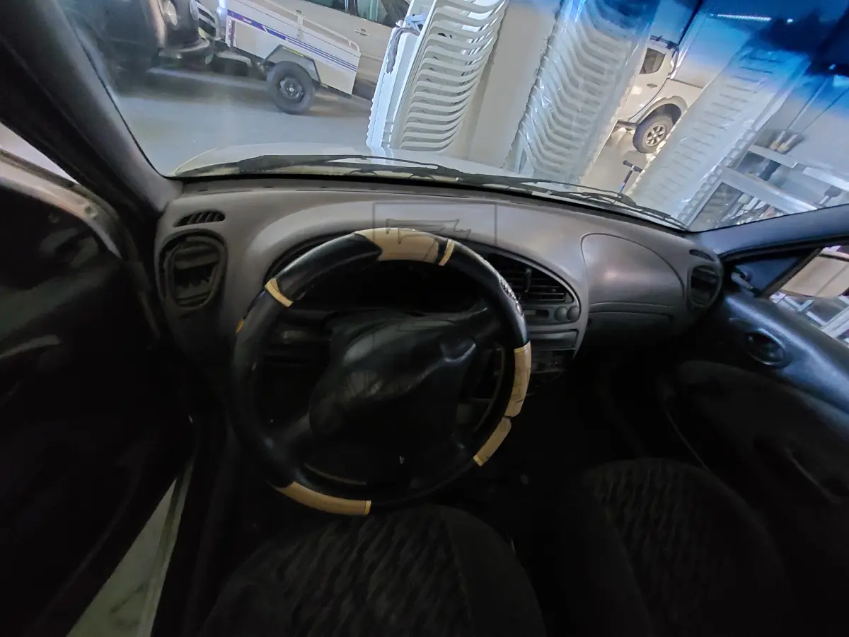 LOTE 003 - Uma camionete da marca FORD/CURIER CLX, carroceria aberta, placas IHB-8884,  cor branca, ano/modelo 1998/1998, RENAVAM 691503087.