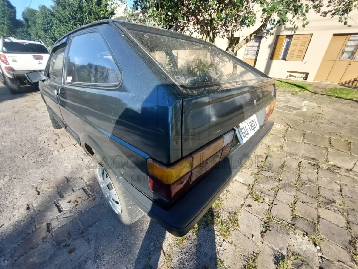 LOTE 011 - Um automóvel da marca VW-VOLKSWAGEN/GOL GL, placas IGU-1801, na cor verde, à  gasolina, ano/modelo 1987/1987, RENAVAM 562591583.