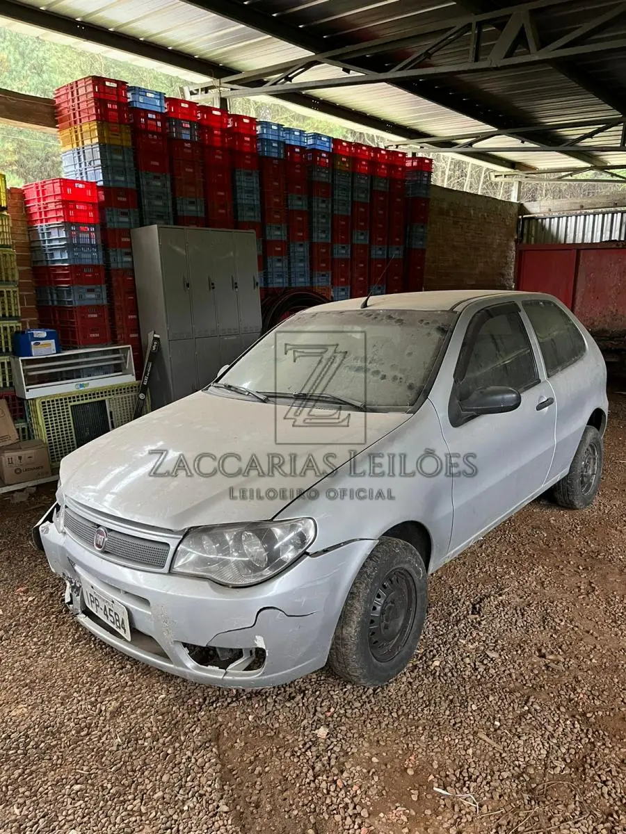 LOTE 002 - Um automóvel da marca FIAT/PALIO FIRE ECONOMY, placas IPP-4584, na cor prata, ano/modelo  2009/2010, à Álcool/Gasolina, RENAVAM Nº 128982276.