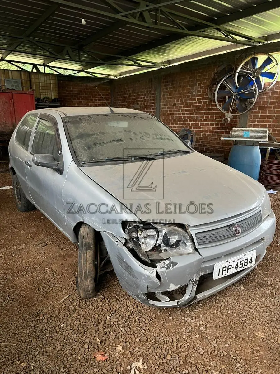 LOTE 002 - Um automóvel da marca FIAT/PALIO FIRE ECONOMY, placas IPP-4584, na cor prata, ano/modelo  2009/2010, à Álcool/Gasolina, RENAVAM Nº 128982276.
