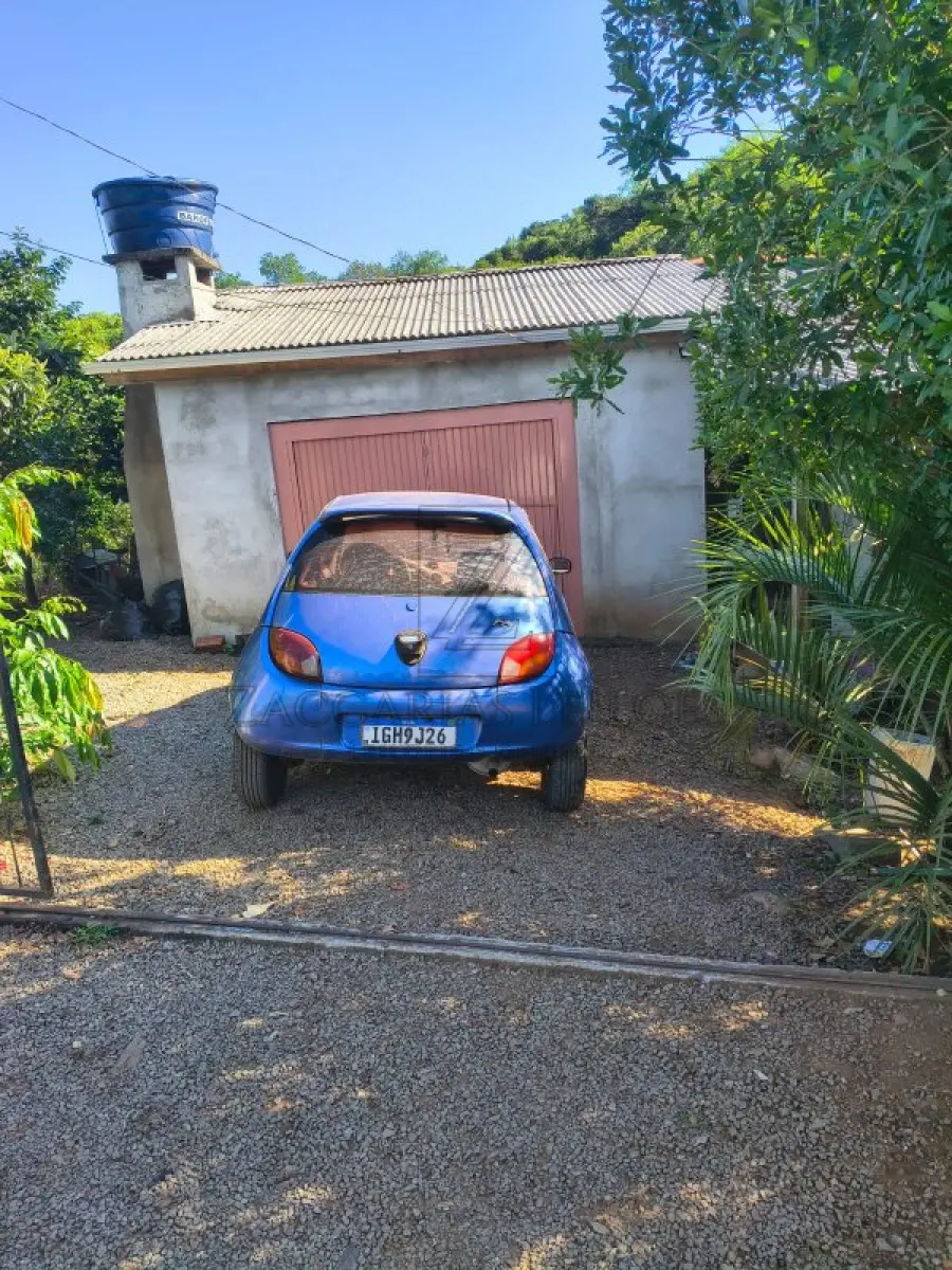 LOTE 004 - Um Automóvel da marca FORD/KA, placas IGH9J26, na cor azul, à Gasolina, ano/modelo  1997/1997, RENAVAM 675800277.