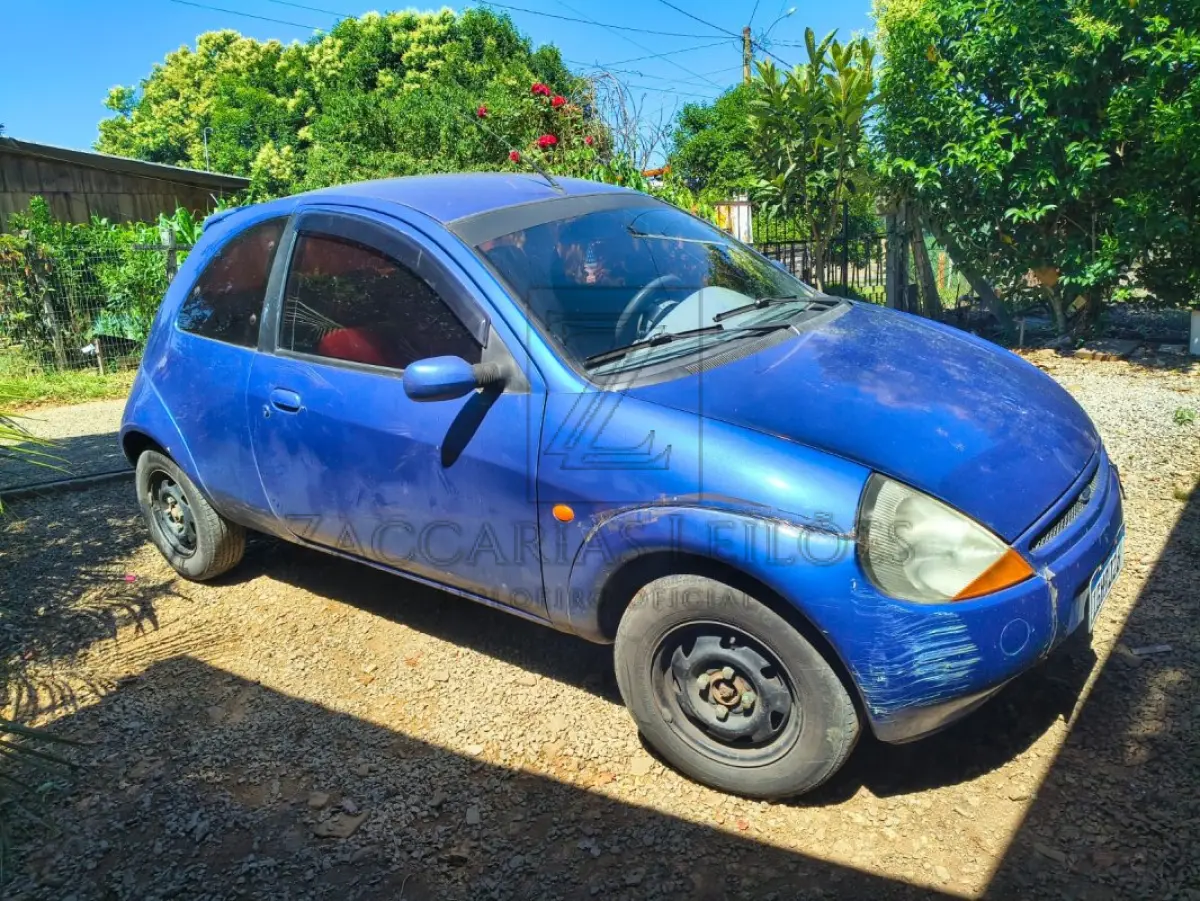 LOTE 004 - Um Automóvel da marca FORD/KA, placas IGH9J26, na cor azul, à Gasolina, ano/modelo  1997/1997, RENAVAM 675800277.