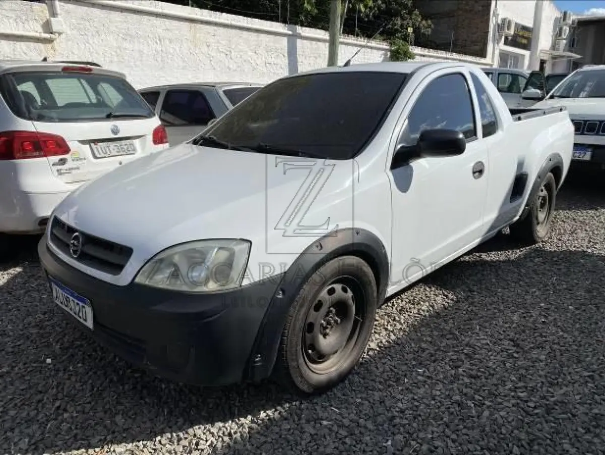 LOTE 005 - Camionete GM/MONTANA, ano/modelo 2004/2004, cor branca, placas ALU3J20, Chassis  9BGXF80004C214891, RENAVAM 828856397.