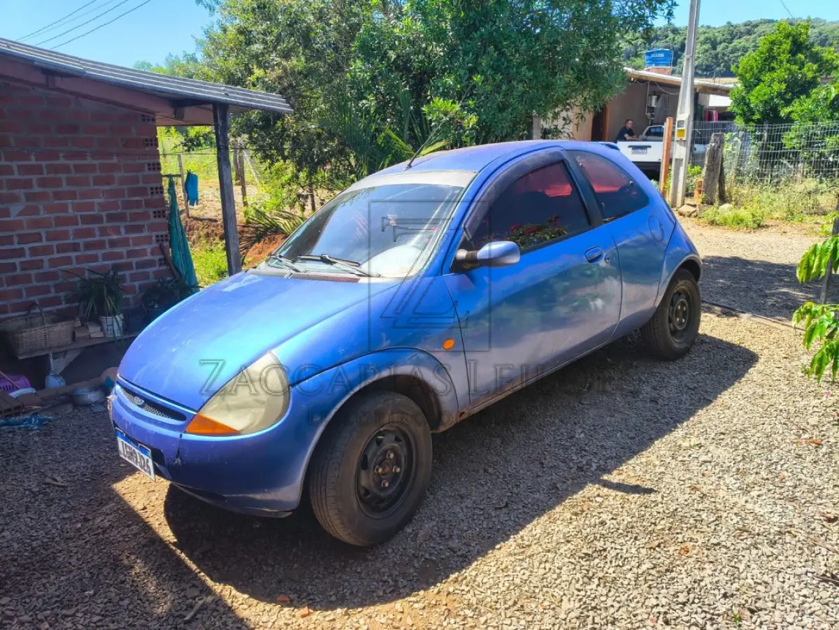 LOTE 004 - Um Automóvel da marca FORD/KA, placas IGH9J26, na cor azul, à Gasolina, ano/modelo  1997/1997, RENAVAM 675800277.