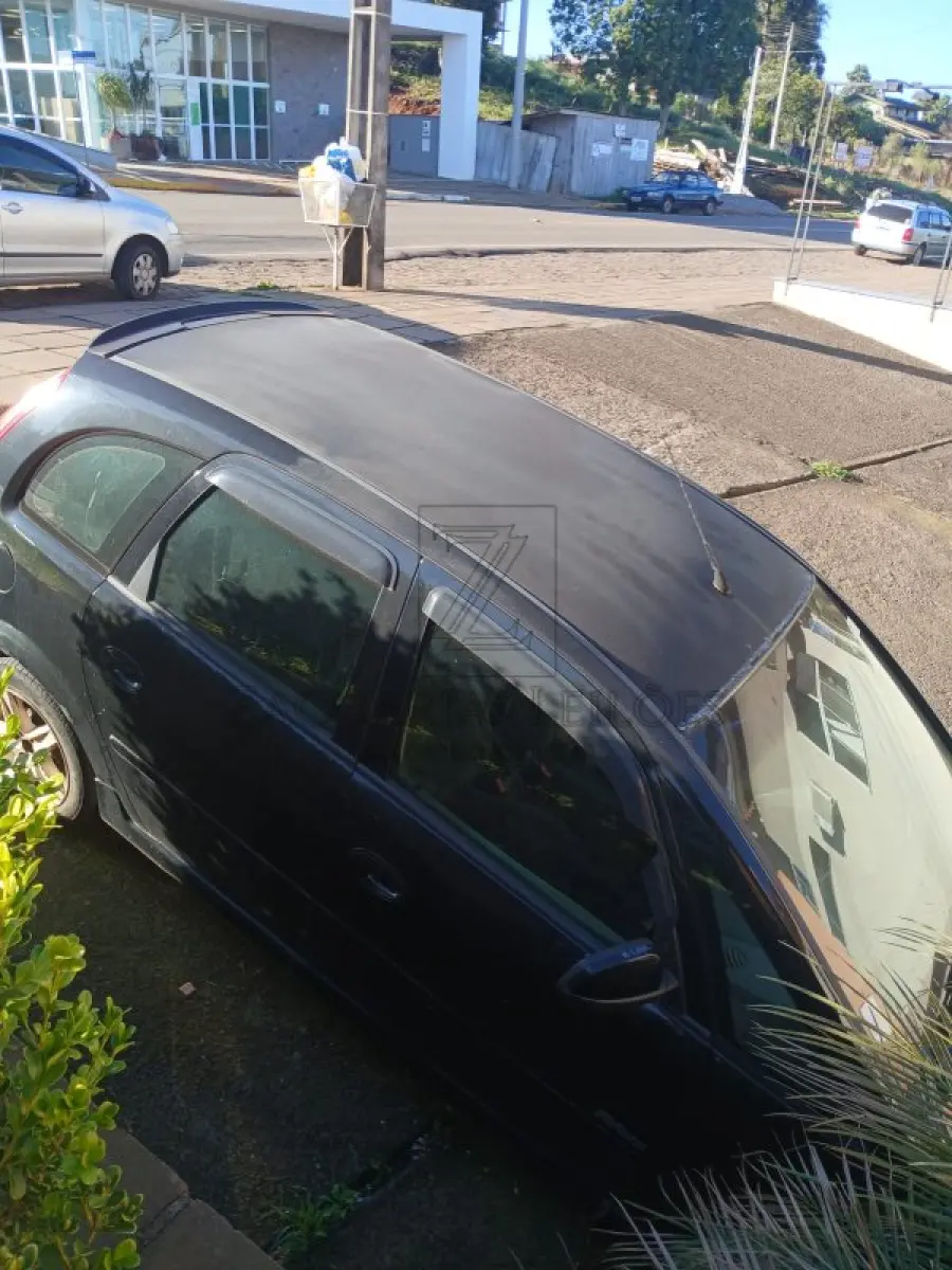 LOTE 004 - Um automóvel da marca GM/MERIVA MAXX placas INZ7251, na cor preta, ano/modelo 2007/2008,  à Álcool/Gasolina, RENAVAN 928515001. Reserva de 50% da cota referente à meação.