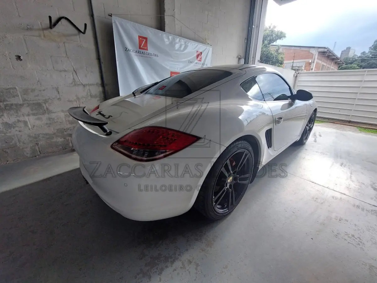 LOTE 001 - Porche Cayman S, ano 2011/12, corbranca, RENAVAM:00331115107, PLACAS: JIP-8B00, IPVA 2025 em situação de dívida ativa no valor de R$ 7.611,79 .