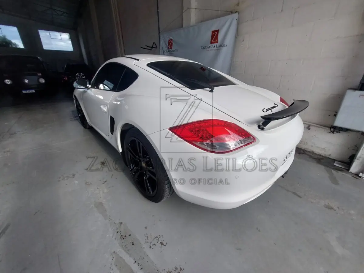 LOTE 001 - Porche Cayman S, ano 2011/12, corbranca, RENAVAM:00331115107, PLACAS: JIP-8B00, IPVA 2025 em situação de dívida ativa no valor de R$ 7.611,79 .