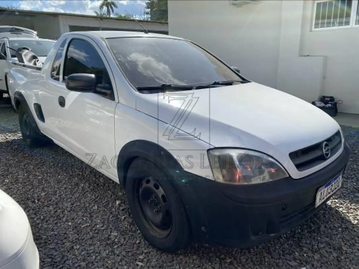 LOTE 005 - Camionete GM/MONTANA, ano/modelo 2004/2004, cor branca, placas ALU3J20, Chassis  9BGXF80004C214891, RENAVAM 828856397.