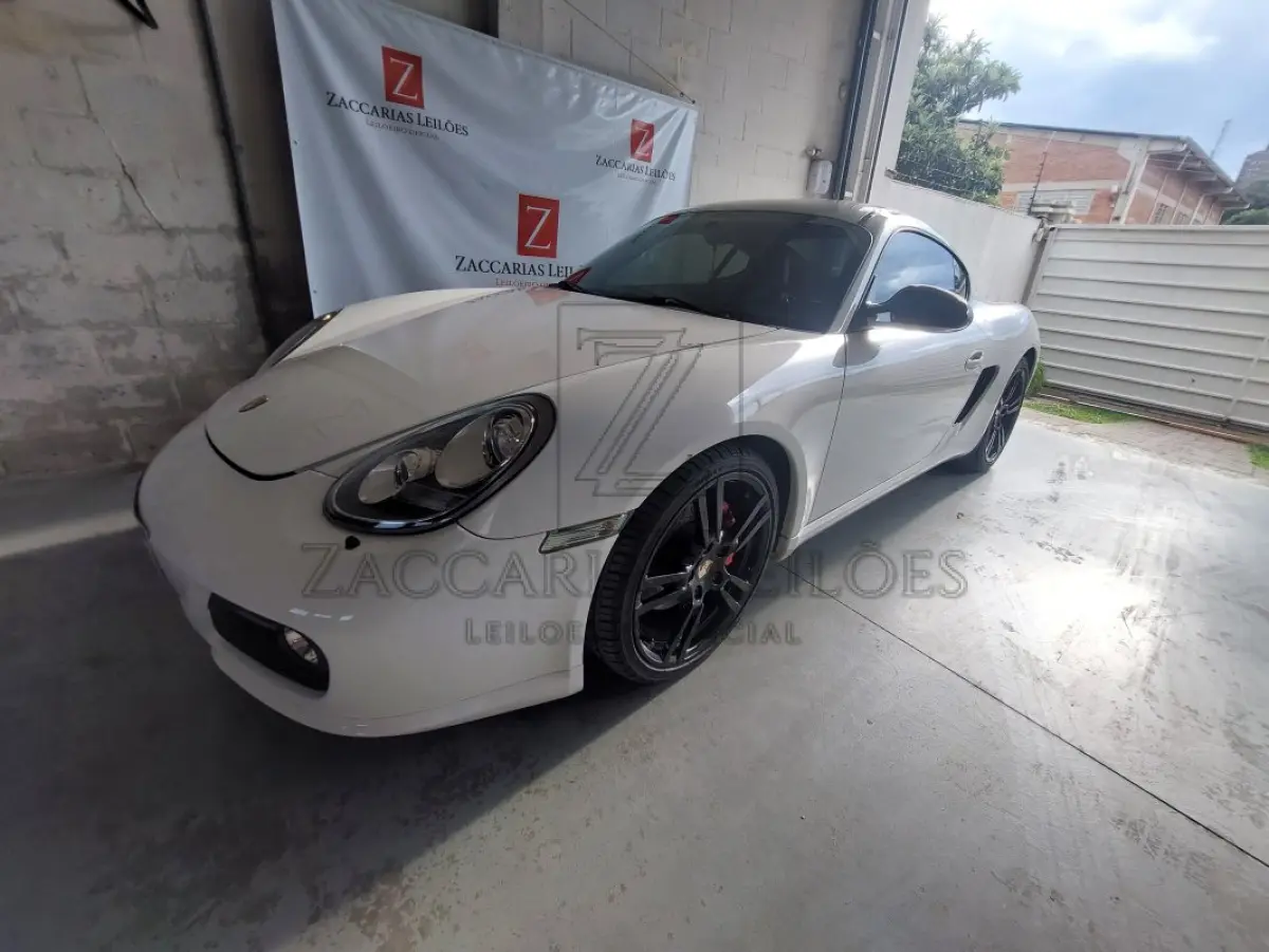 LOTE 001 - Porche Cayman S, ano 2011/12, corbranca, RENAVAM:00331115107, PLACAS: JIP-8B00, IPVA 2025 em situação de dívida ativa no valor de R$ 7.611,79 .