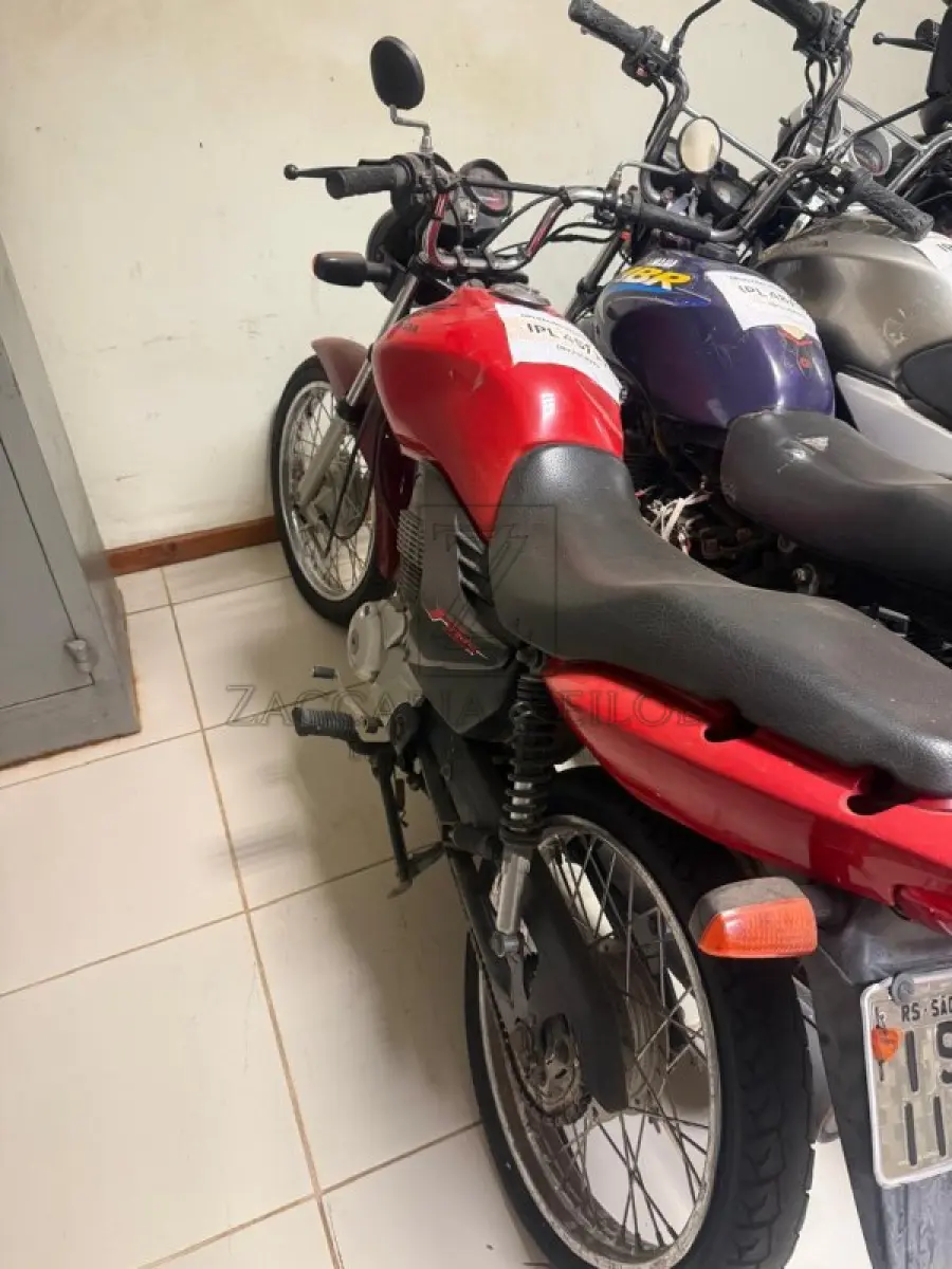 LOTE 009 - HONDA/CG 125 FAN ES, Placa: ISE1135, ano/modelo: 2011/2011 Cor: VERMELHA / Chassi: 9C2JC4120BR723990.