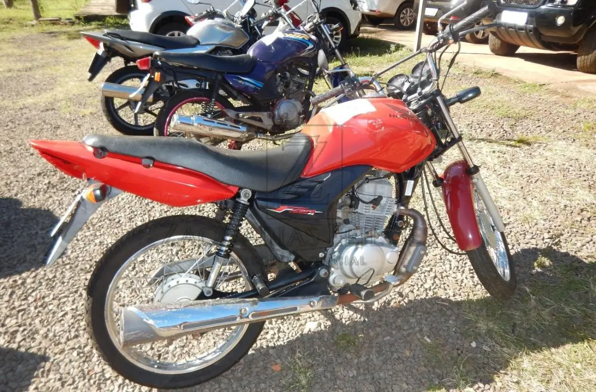 LOTE 009 - HONDA/CG 125 FAN ES, Placa: ISE1135, ano/modelo: 2011/2011 Cor: VERMELHA / Chassi: 9C2JC4120BR723990.