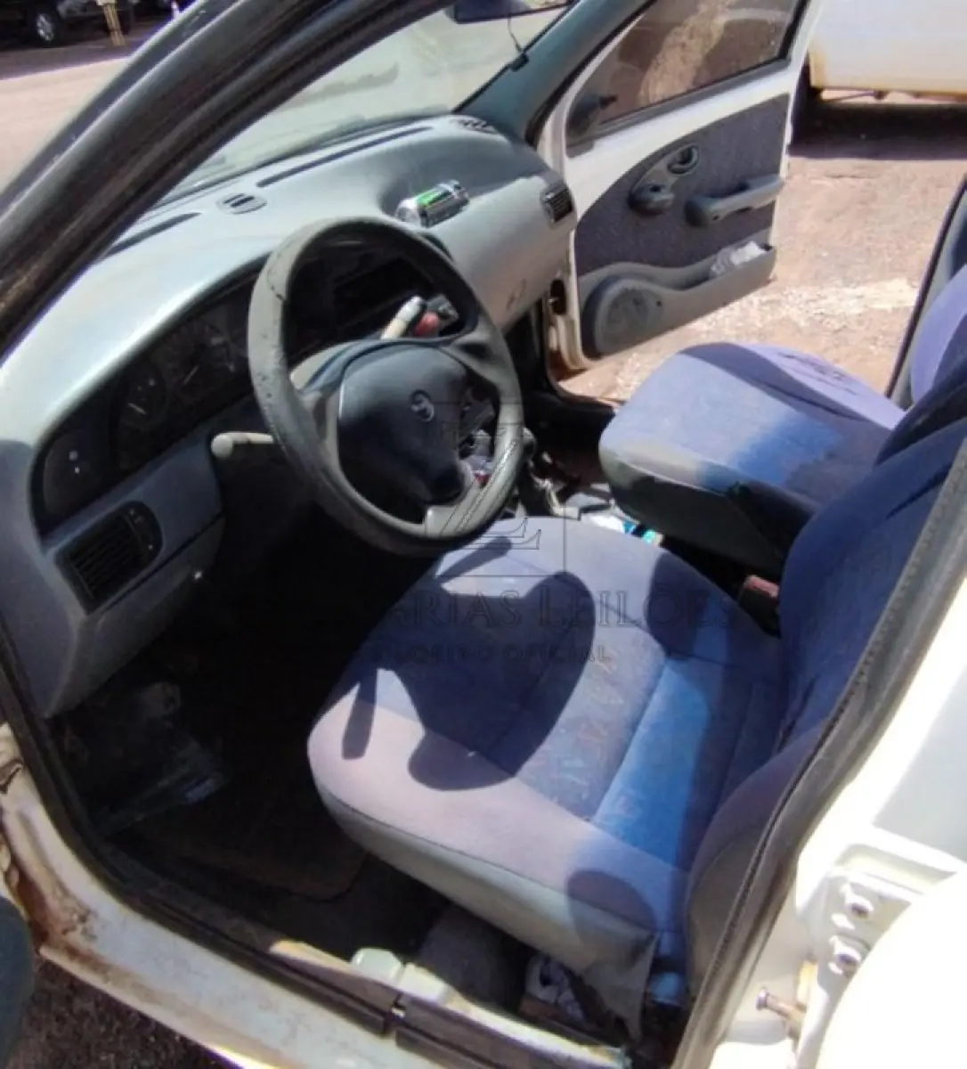 LOTE 006 - Fiat/Palio EL, placa LXW2426, ano/modelo 1996/1996, na cor branca chassis nº 9BD178237T0011119, RENAVAM: 00655006133.