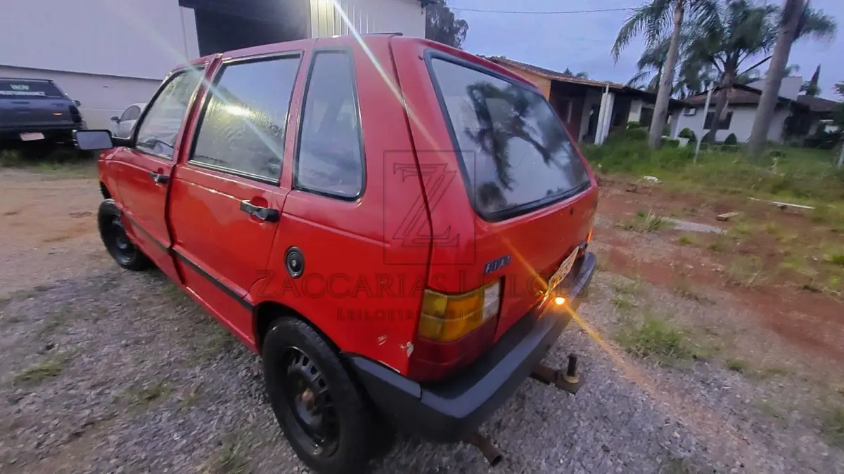 LOTE 005 - Automóvel FIAT/Uno Mille 1.0 Electronic 4p, ano de fabricação/modelo 1995/1995, cor Vermelha, combustível Gasolina, Placa ICR6281, RENAVAM 630685282, Chassi 9BD14600055417400, Motor 146C40114200357.