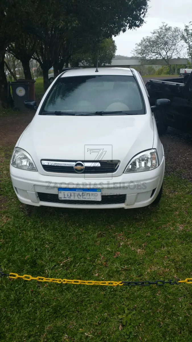 LOTE 001 - Um automóvel da marca GM-CHEVROLET/CORSA HATCH MAXX, ano/modelo	2010/2011, cor branca, placas IQT-6E11
