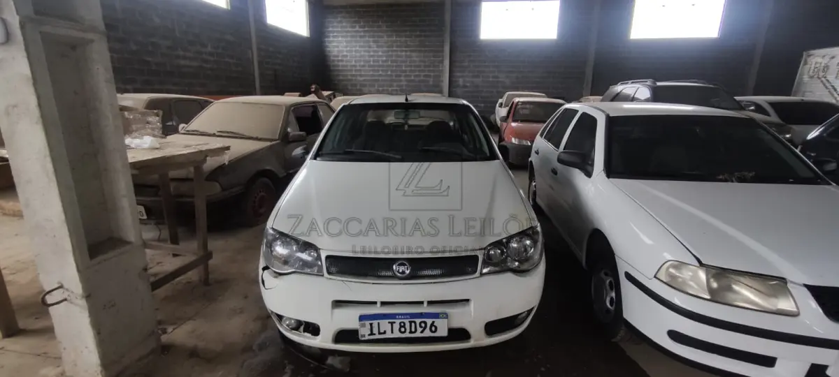 LOTE 006 - Um automóvel da marca FIAT/PALIO ELX, placas ILT-8D96, na cor branca, à gasolina, ano/modelo 2004/2004, RENAVAM 825835747.