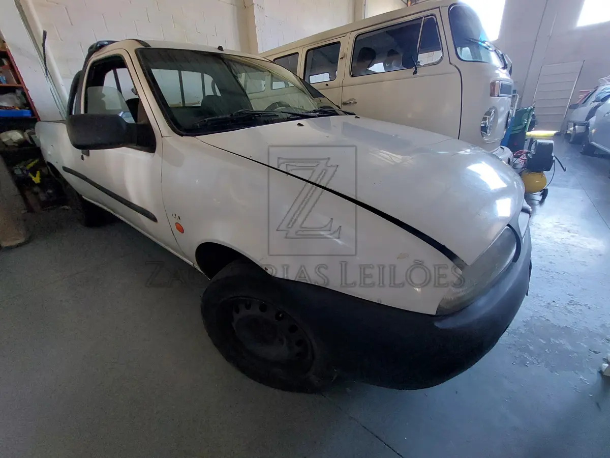LOTE 003 - Uma camionete da marca FORD/CURIER CLX, carroceria aberta, placas IHB-8884,  cor branca, ano/modelo 1998/1998, RENAVAM 691503087.
