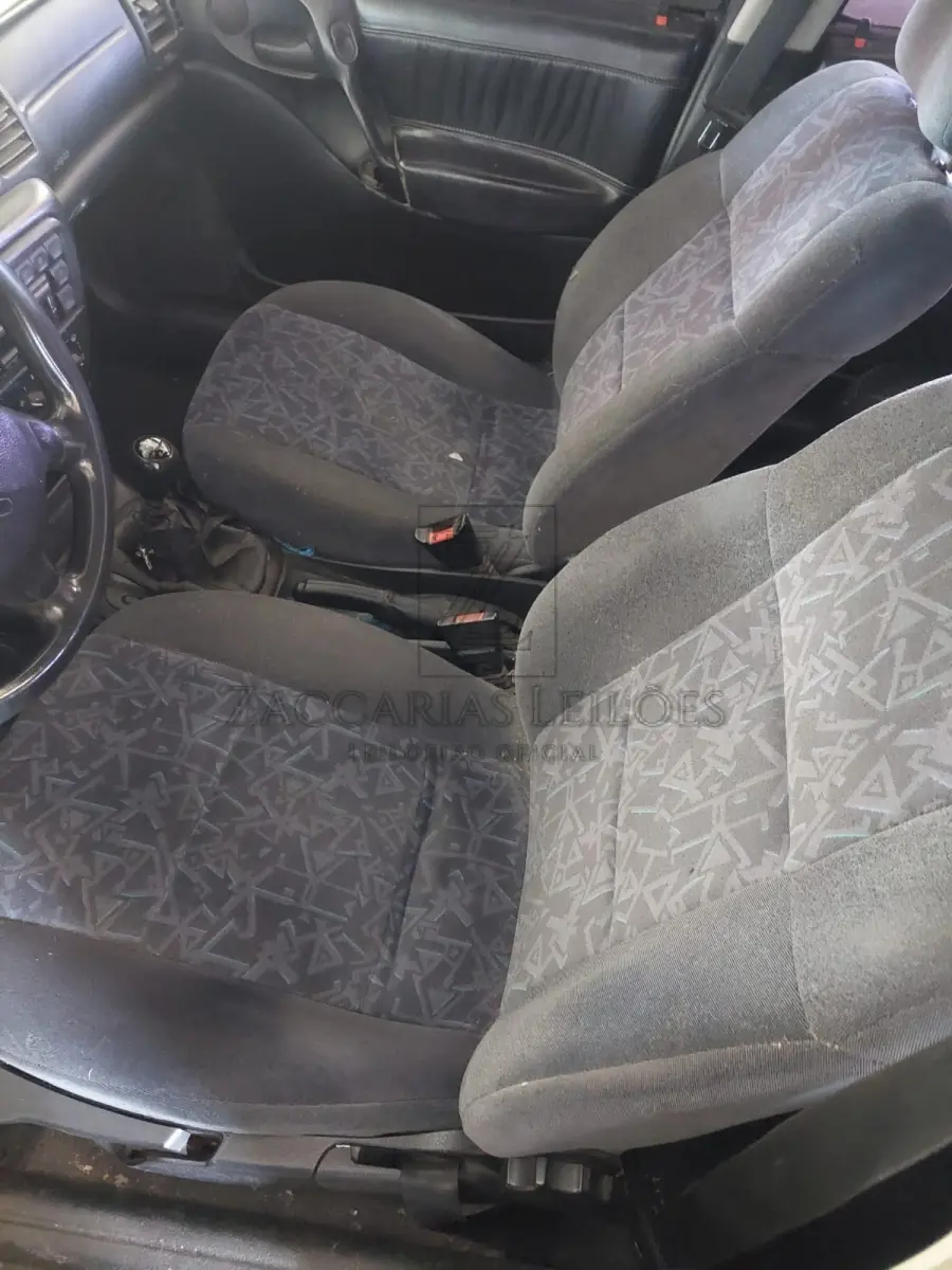 LOTE 005 - Um automóvel da marca GM-CHEVROLET/VECTRA CD, placas IFQ-7698, na cor verde,  ano/modelo 1996/1997, RENAVAM 664073484.