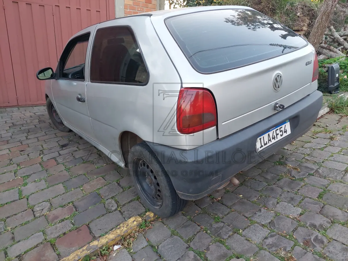 LOTE 006 - Um automóvel da marca VW-VOLKSWAGEN/GOL SPECIAL, placas ILA-4F54, na cor prata,  ano/modelo 2002/2003, RENAVAM 797546480.