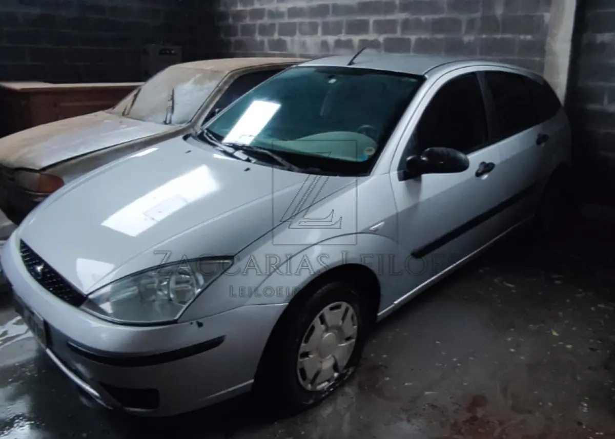 LOTE 003 - Um automóvel da marca FORD/FOCUS 1.6L HA, placas DVL-4718, ano/modelo 2006/2007, na cor  prata, RENAVAM 903306832.