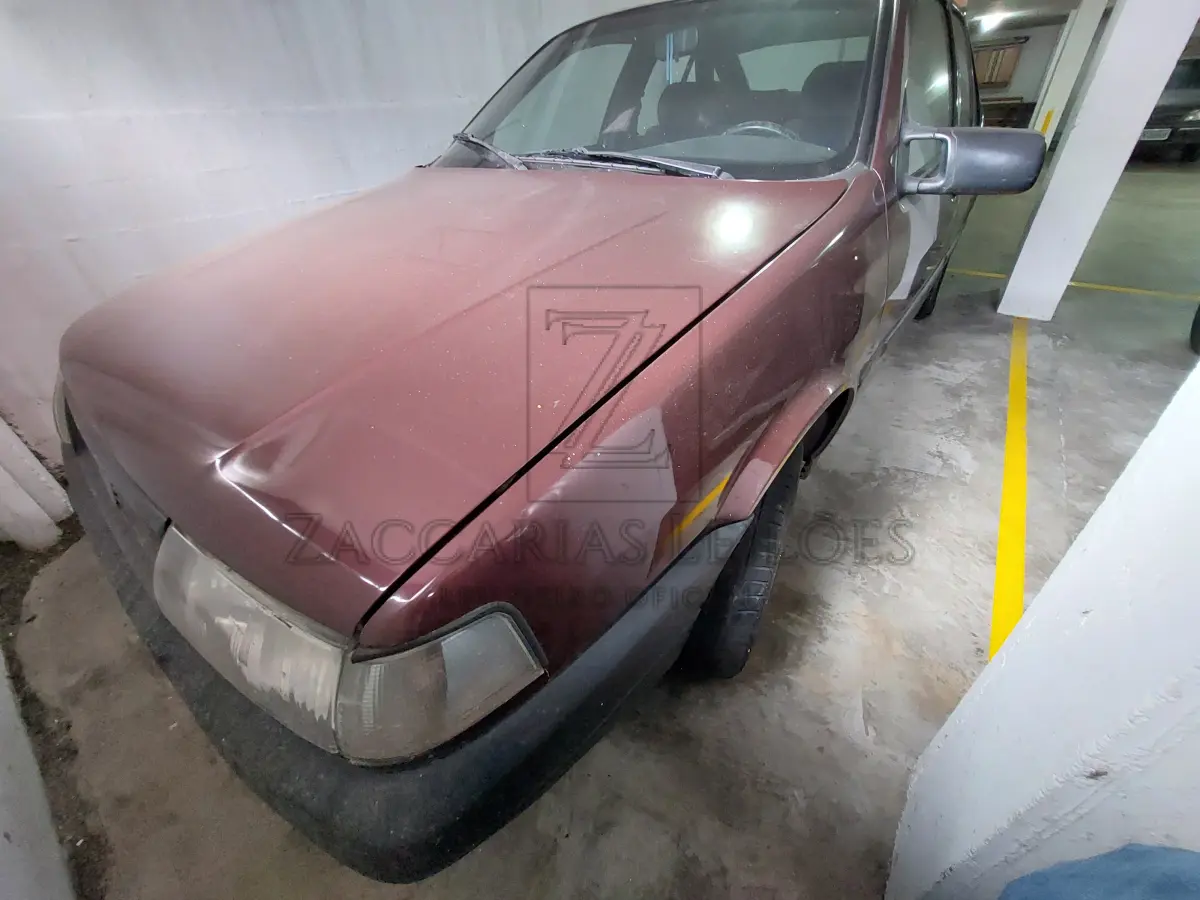 LOTE 002 - Um automóvel da marca FIAT/TEMPRA SX, placas IHF-8498, na cor vermelha,  ano/modelo 1998/1998, à gasolina, RENAVAM 00694527157.