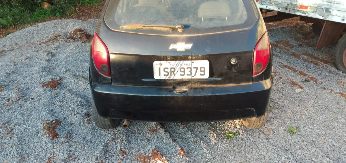 LOTE 010 - Um automóvel da marca CHEVROLET/CELTA 1.0L LT, placas ISR9379, na cor preta, à álcool/gasolina, ano/modelo 2011/2012, RENAVAM nº 419605282.