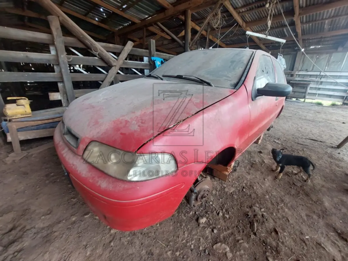 LOTE 010 - Um automóvel da marca FIAT/PALIO FIRE FLEX, placas IMX8A86, na cor vermelha, ano/modelo  2006/2006, RENAVAM 875658075.