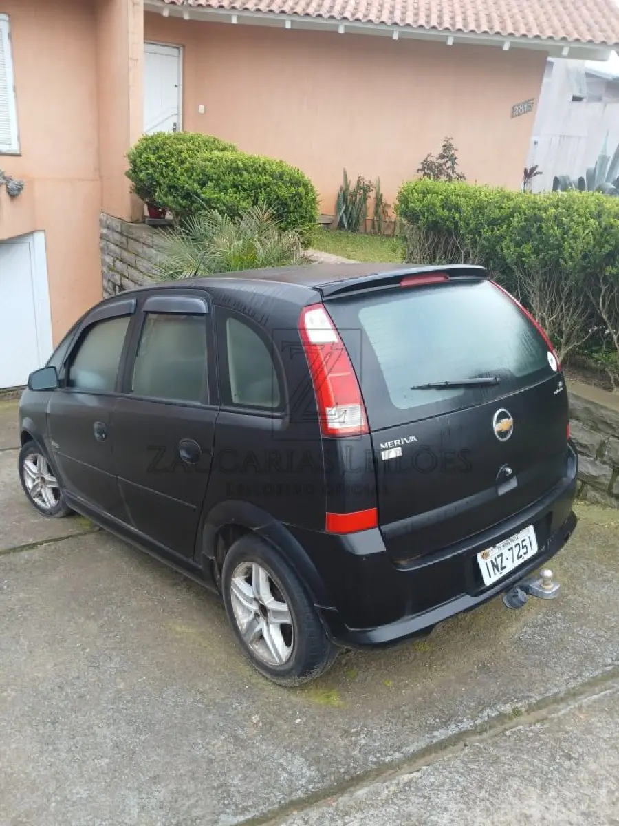 LOTE 004 - Um automóvel da marca GM/MERIVA MAXX placas INZ7251, na cor preta, ano/modelo 2007/2008,  à Álcool/Gasolina, RENAVAN 928515001. Reserva de 50% da cota referente à meação.