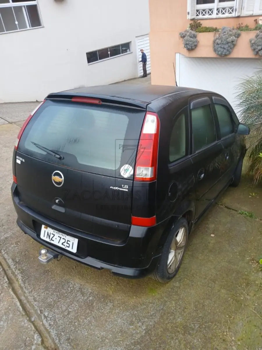 LOTE 004 - Um automóvel da marca GM/MERIVA MAXX placas INZ7251, na cor preta, ano/modelo 2007/2008,  à Álcool/Gasolina, RENAVAN 928515001. Reserva de 50% da cota referente à meação.